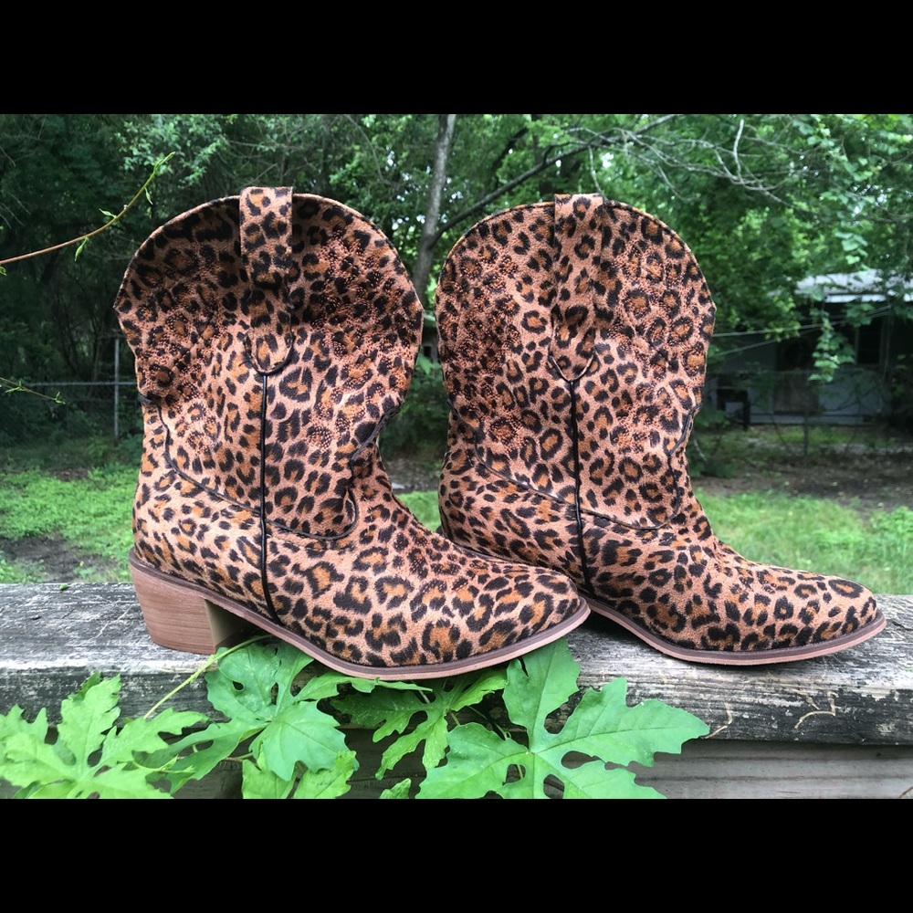 Take a walk on the wild side with cheetah print cow girl boots. Yee Haw !